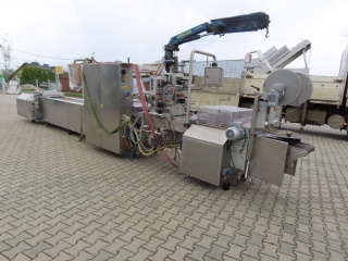 Thermoforming vacuum packaging machine Tiromat Powerpack typ 660 for hard foil with labeller CFS type TL 100 and TL 150